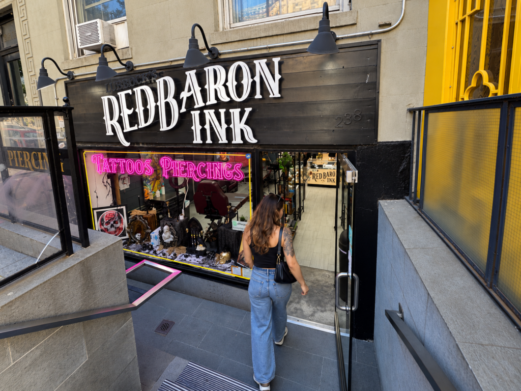 Walking into Red Baron ink for a tattoo and piercing
